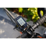 Bicycle computer on a handlebar with a blurred background