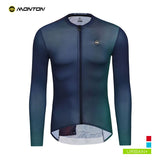 A long-sleeve cycling jersey by Monton, featuring a dark blue to green gradient design, a full-length front zipper, and a small circular logo on the left chest, shown against a plain white background.