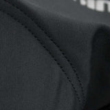 Close-up of black fabric with visible stitching detail