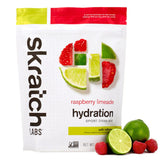 Skratch Labs raspberry limeade hydration drink mix package with fruit graphics on a white background